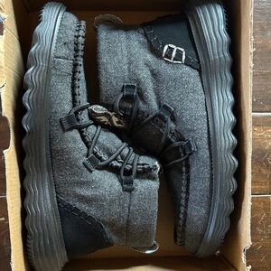 Gray and black women’s Hey Dudes